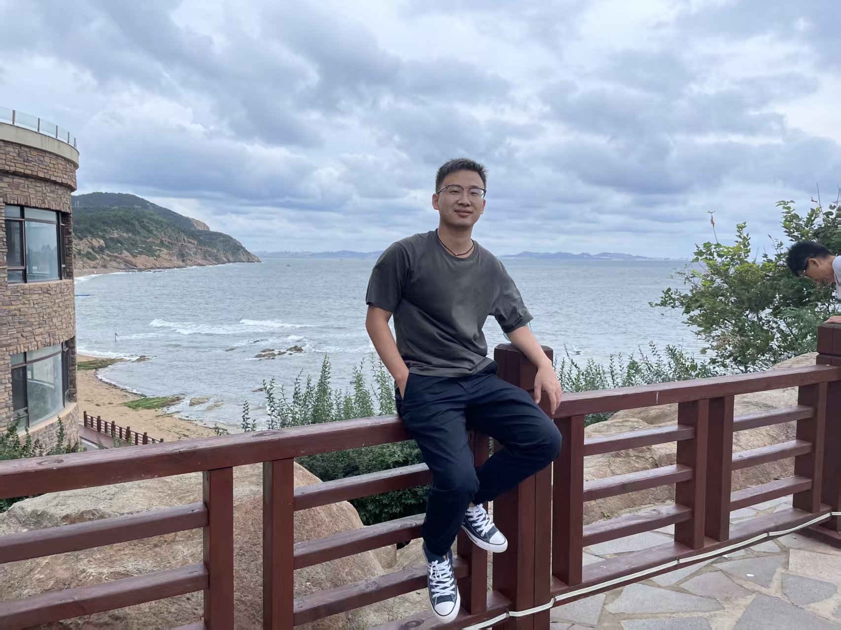 Chi Zhang by the sea